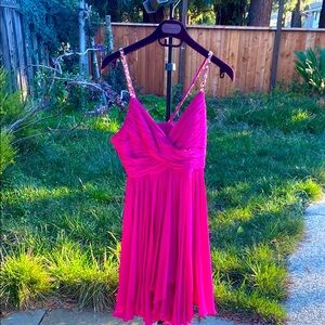 Marchesa’s Notte 
Fuchsia party dress with jeweled straps,  size 8